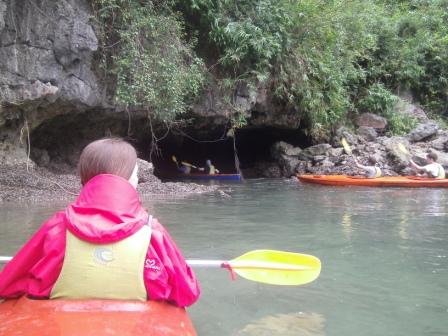 Lali kayaking in Halong Bay near the cave