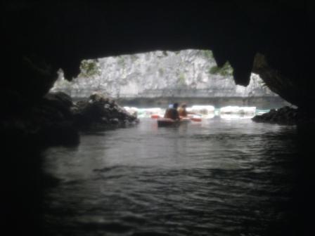 Lali kayaking inside the cave. See at the back the hidden lake